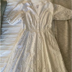 white eyelet puff sleeved dress.